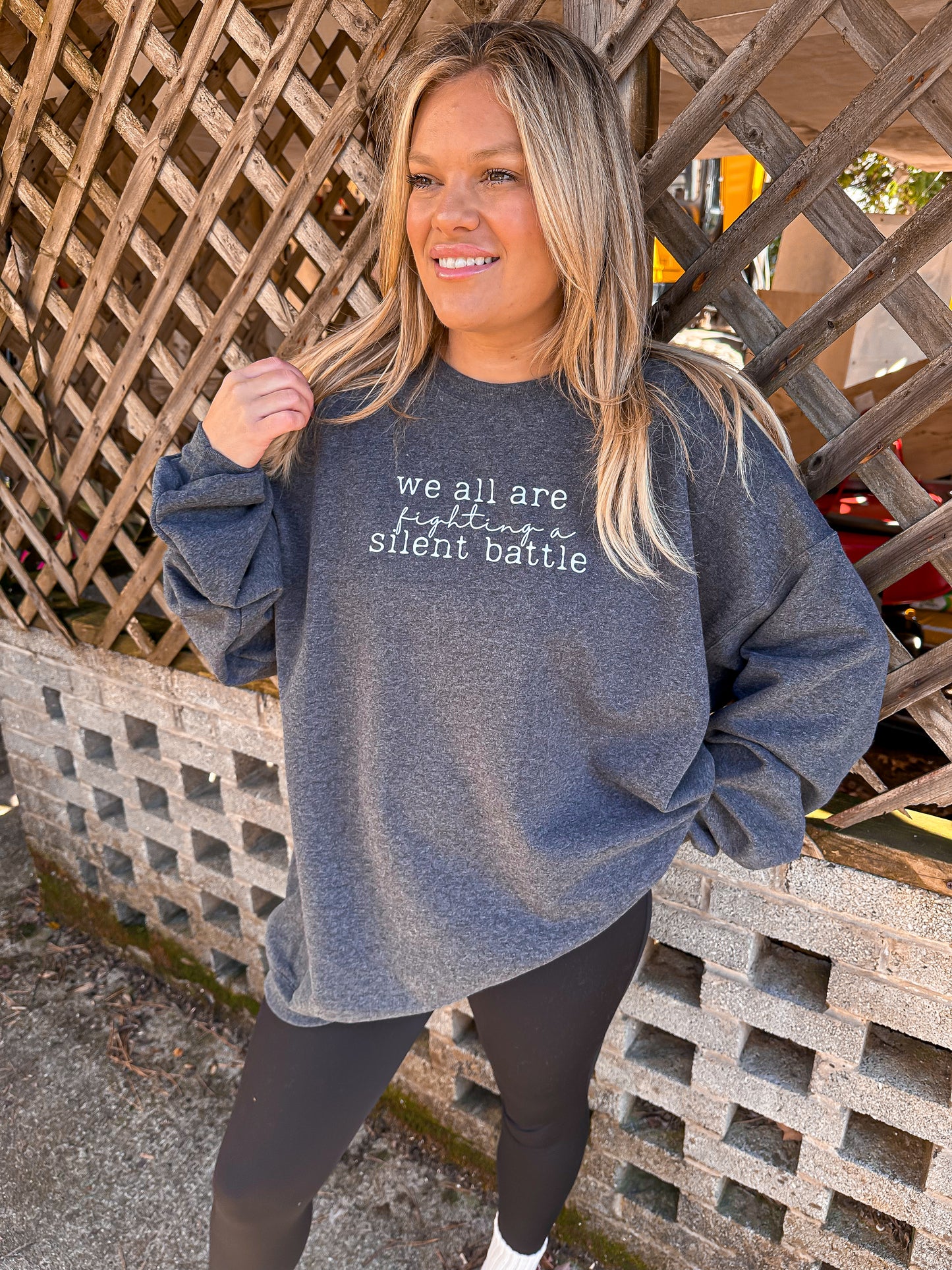 We are all Fighting A Battle Sweatshirt