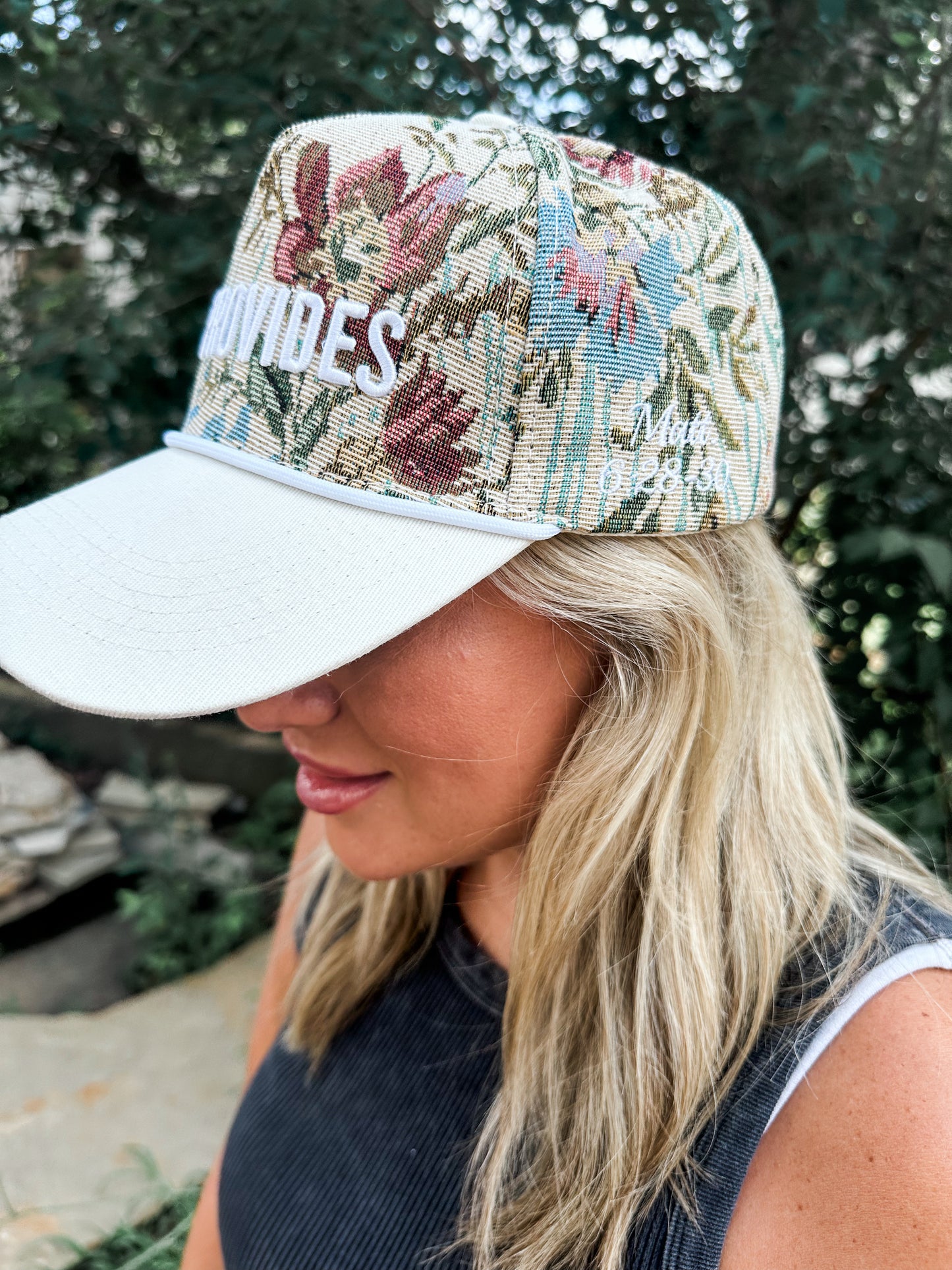 He Provides Floral Hat