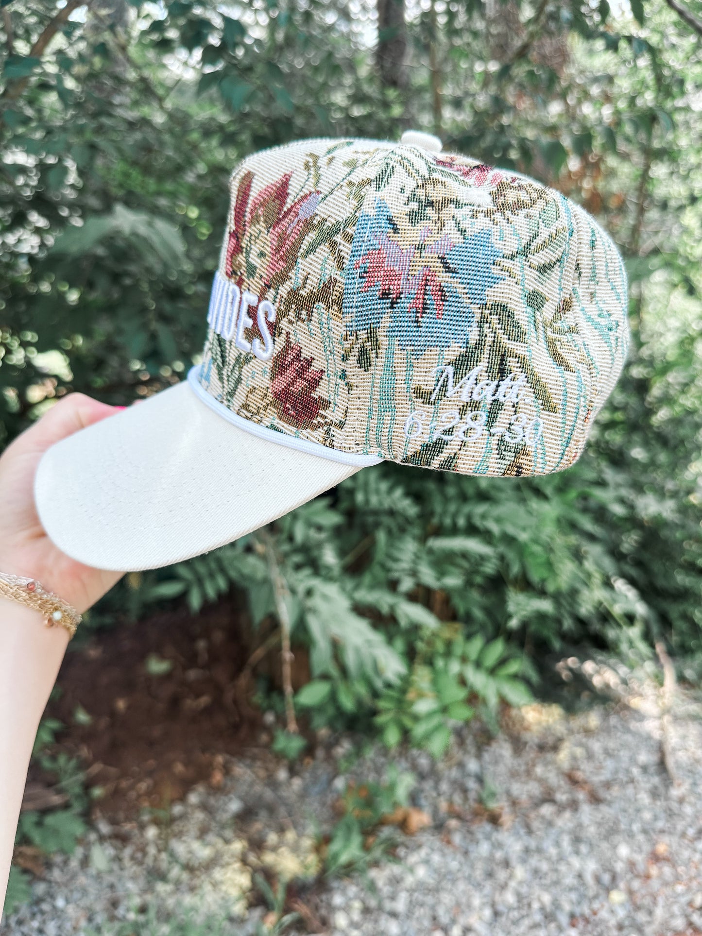 He Provides Floral Hat