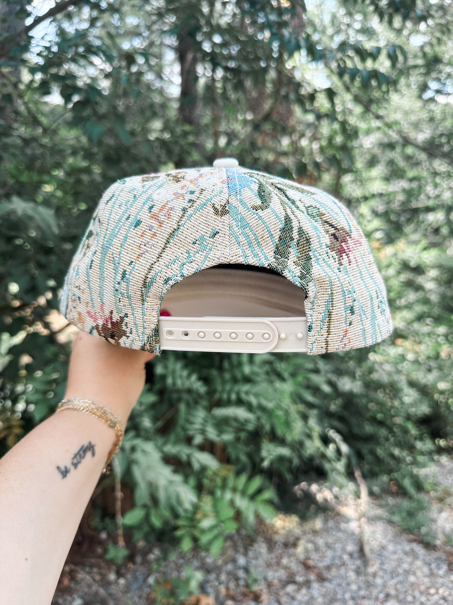 He Provides Floral Hat