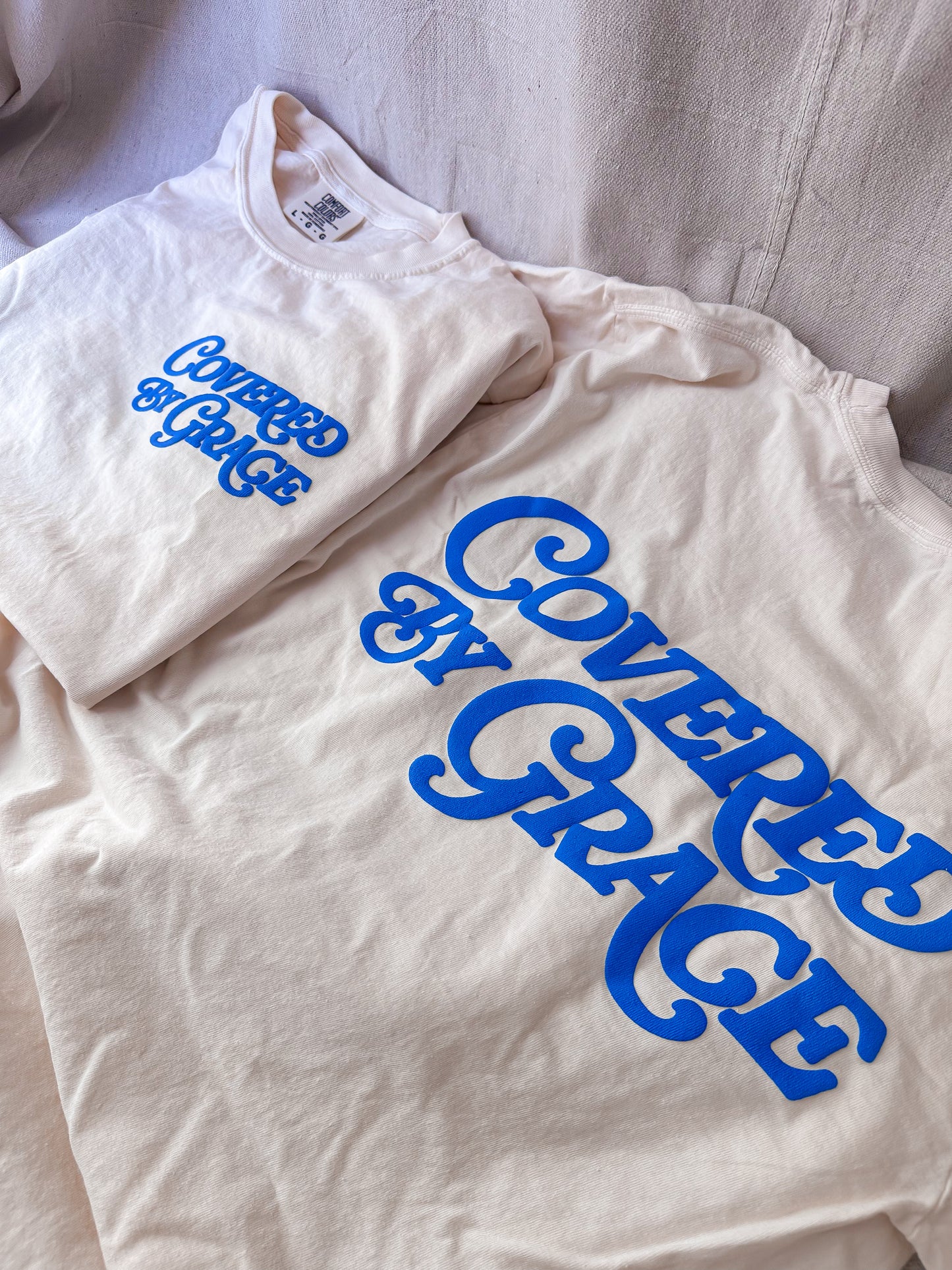 Covered By Grace blue puff- Ivory Tee